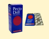 Pecto Drill tabletki do ssania i syrop. Opakowania leku na kaszel.